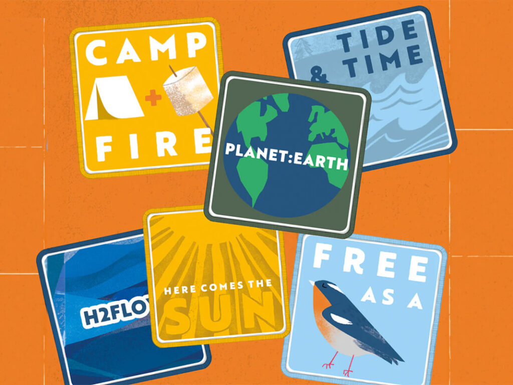 Patches on an orange surface celebrate adventure: “CAMP FIRE,” “PLANET EARTH,” “TIDE & TIME,” and more.